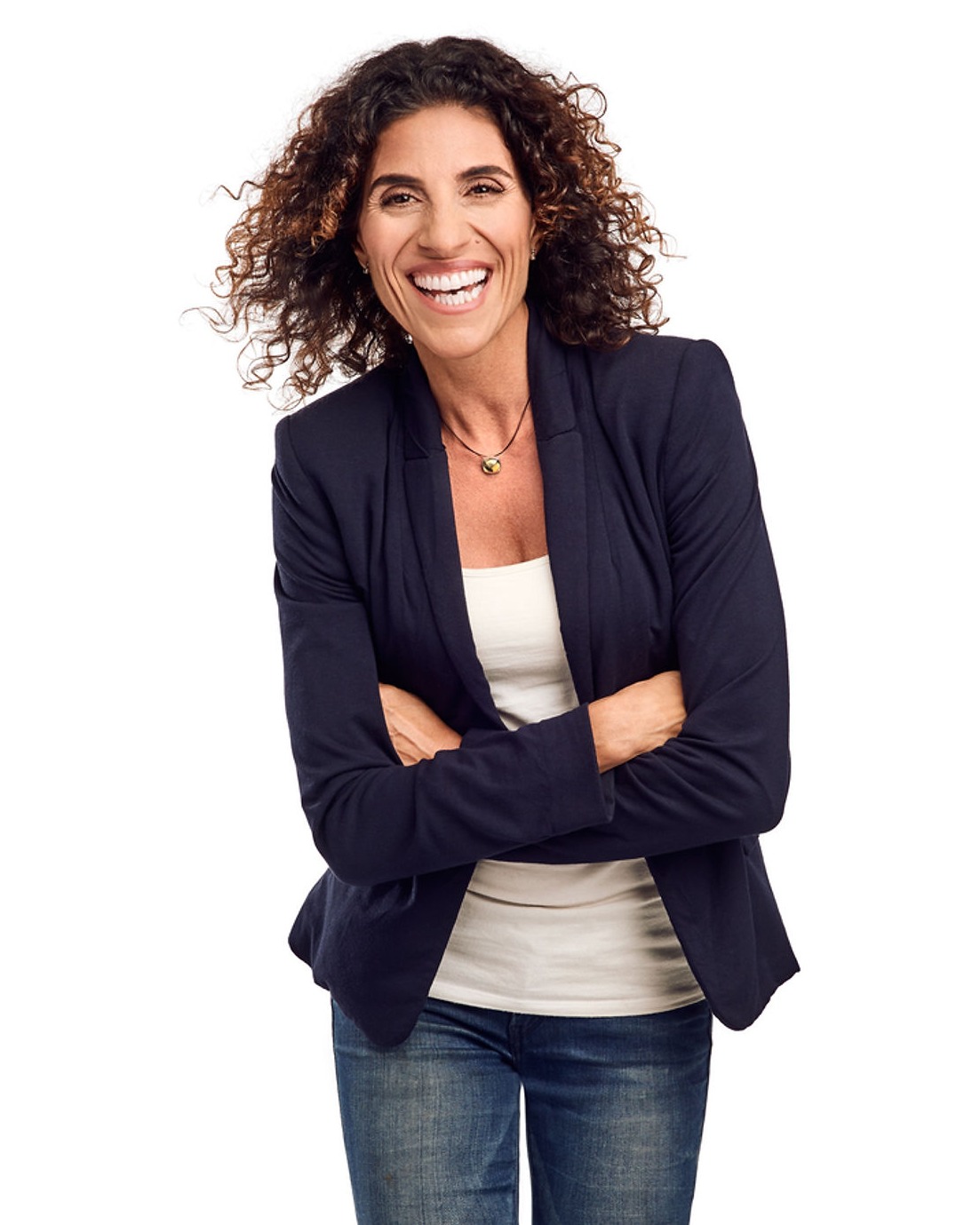 Maya Rasak, MFT, smiling warmly with arms crossed